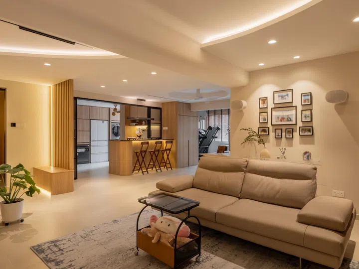 The custom-built snack cabinet is constructed from the same material as the kitchen. 