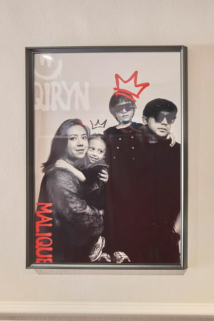 A series of framed works, including pieces by Mayang and Hafiz, introduces the home’s emphasis on self-created art and individual expression.