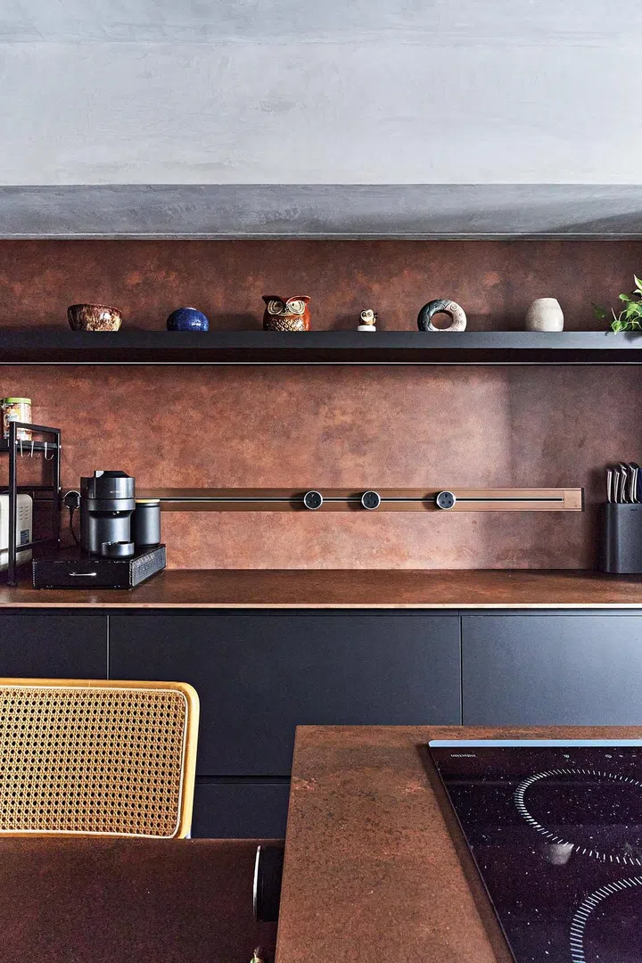 The induction hob cooker was relocated to the kitchen island in this 3-room HDB flat in Ang Mo Kio.