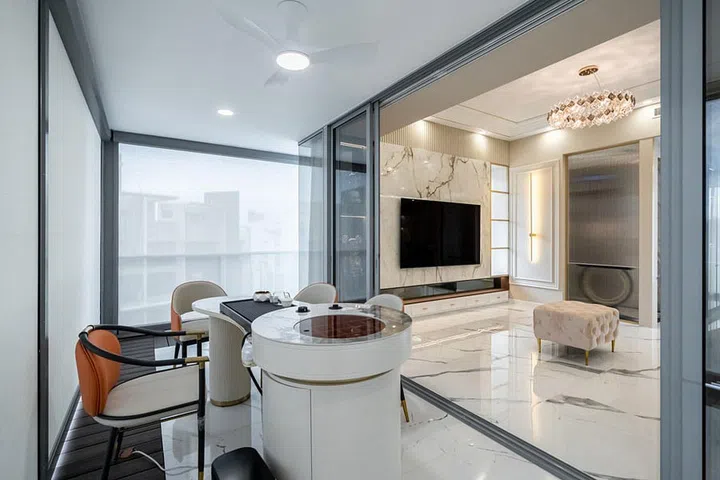 The juxtaposition of the modern rococo elements in the living room creates a visual feast for the senses, marrying the elaborate detailing of traditional rococo with the clean lines and minimalist appeal of modern design. The result is a harmonious blend of styles, where the ornate and the contemporary coexist in perfect synergy.