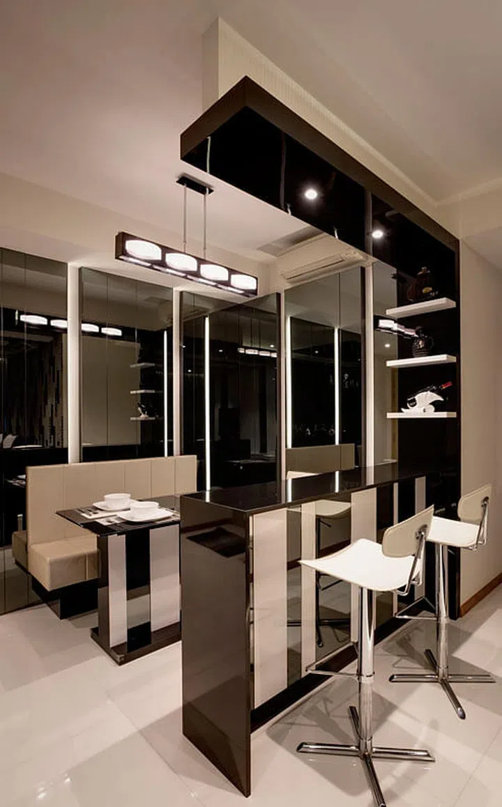 Black and white dining room in a 3-bedroom condominium apartment along Yio Chu Kang Road, housing a family of four.