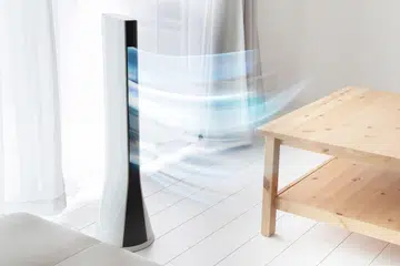 Tower fan with breeze in the living room