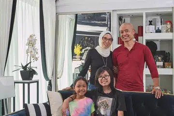 A nurse and teacher, their two young daughters and two cats live in this 5-room HDB DBSS at Ang Mo Kio Street 52 (1,206 sq ft), designed by Black & White Haus.