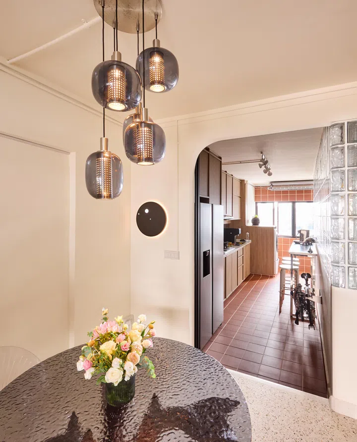 Stanley’s careful planning extended to his custom-built shaker kitchen, where warm wood tones and terracotta tiles balance modern practicality with timeless appeal.