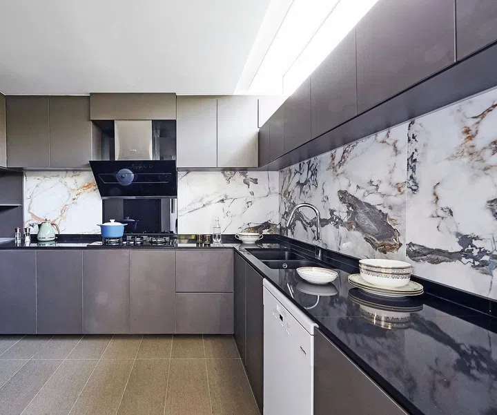 Spacious, fully-equipped kitchen where the talented homeowner chef Mrs Kareem showcases her culinary prowess for the family in this 4-storey terrace house in Telok Kurau.