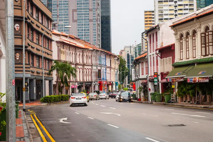 SINGAPORE - APRIL 3: View on Singapore city road with transport and old buildings, april 2016