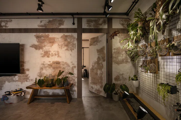 The textured wall hides doorways in this home.
