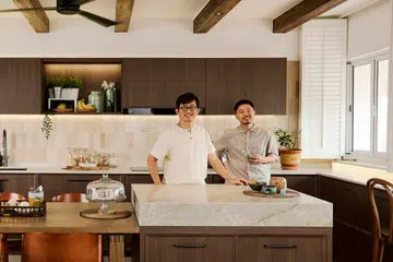 Homeowners Ian and Patrick poses for a photo in their 4-room HDB (1,195 sq ft), self-designed by Ian himself from TALA Design+.
