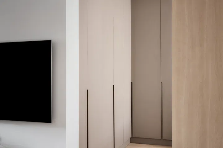 A widened, sliding door makes it easier for retiree Nancy to move around.