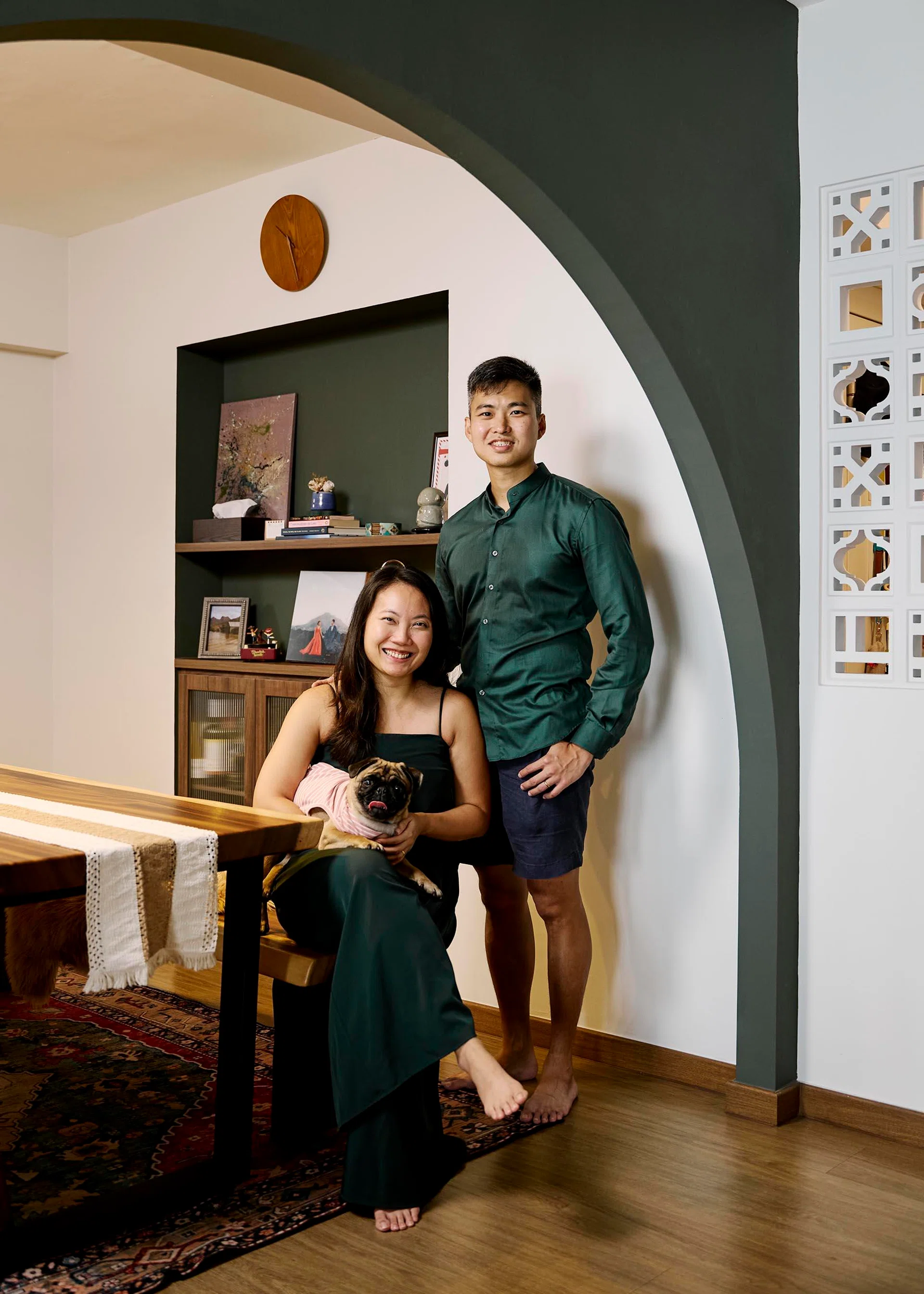 A Singaporean teacher and aviation firefighter couple in their early 30s, and their two pugs, Brie and Chip lives in this 5-room BTO (1,216 sq ft), interiors designed by Etherall.