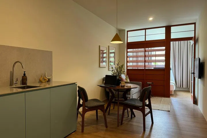 Neat little kitchenette and dining table set within my 1-bedroom suite in Alma House New Bahru.