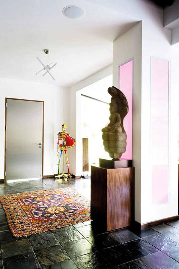 Mr Bones, by Singapore-based pop artist Ketina Patel, stands by the main door to greet visitors in an amusing manner.