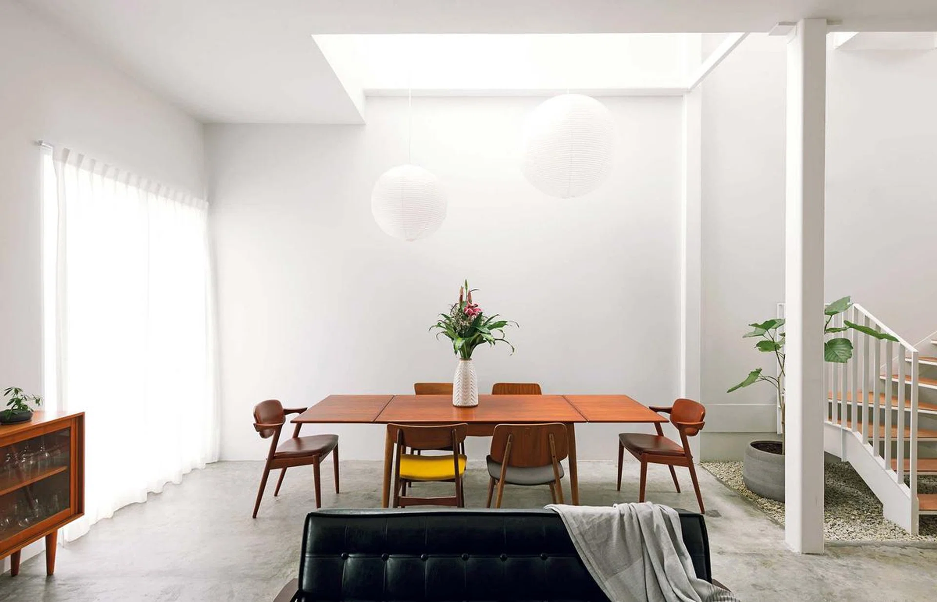 The living and dining rooms have an open plan and an abundance of natural light.