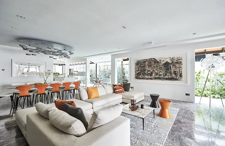 Contemporary living room with all white walls. Interior design by Bowerman.