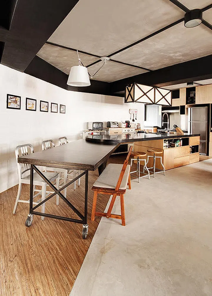 Let your dining table be an extension of your kitchen counter rather than a stand-alone table in the centre of the room, it helps keep your open-concept space appear larger.