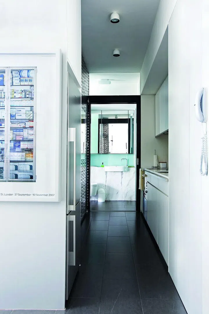 Visitors can loop around the home through the bathroom, which connects to the bedroom and kitchen.