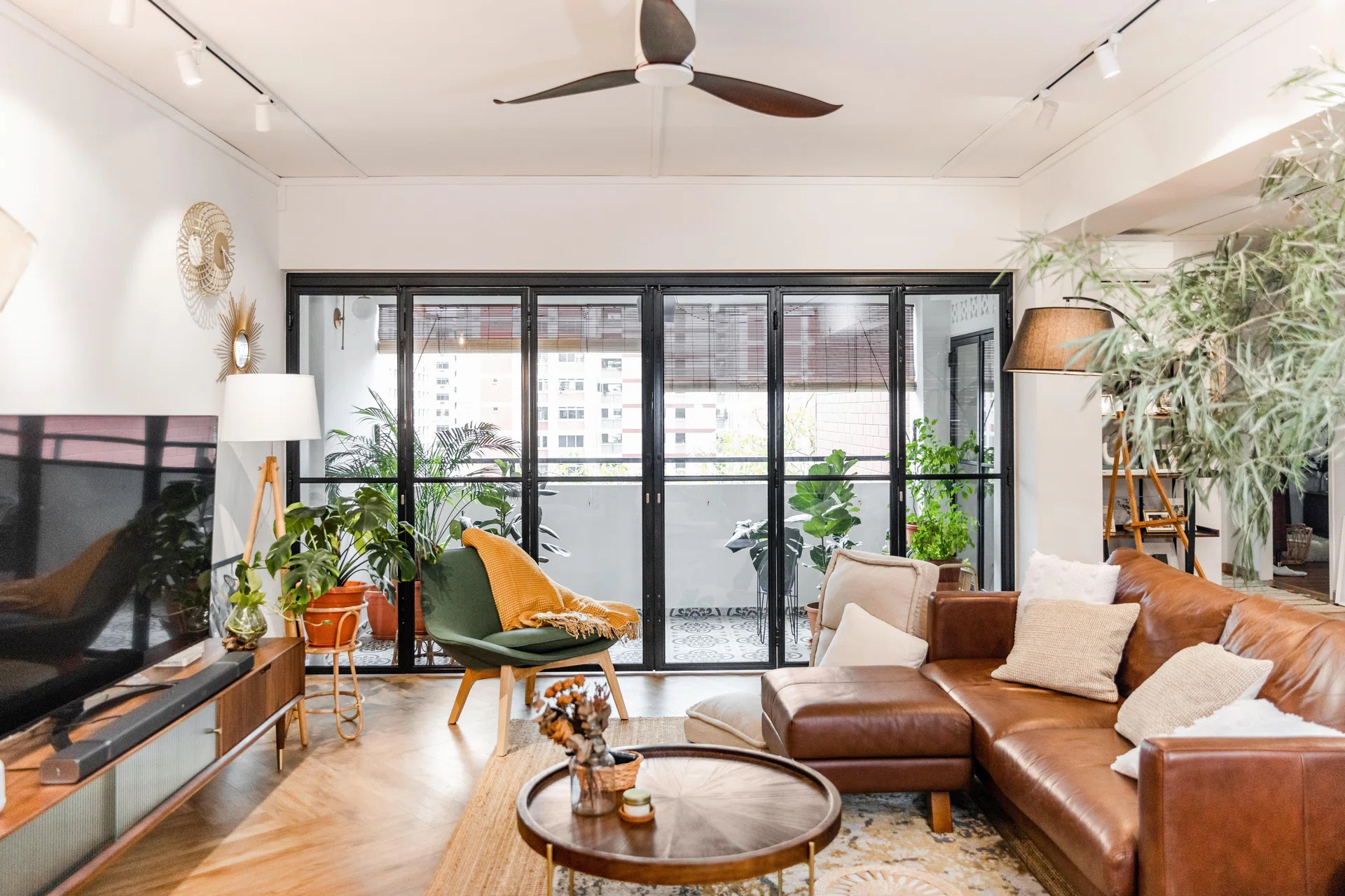 Large windows bring in light and views, but also significant heat—especially in sun-drenched homes without the right layers of protection.