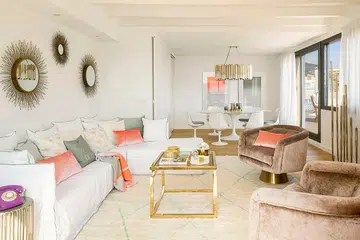 This three-bedroom penthouse in Spain is a family's holiday home that has colourful features to give it a cheerful vibe.