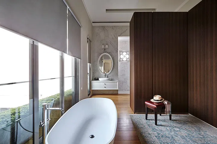 The master bedroom elevates mundane functions into a celebrated ritual.