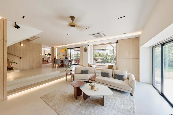 Jason’s Evita sofa anchors the living room, where the family gathers every evening to chat after dinner before retreating to their own spaces.
