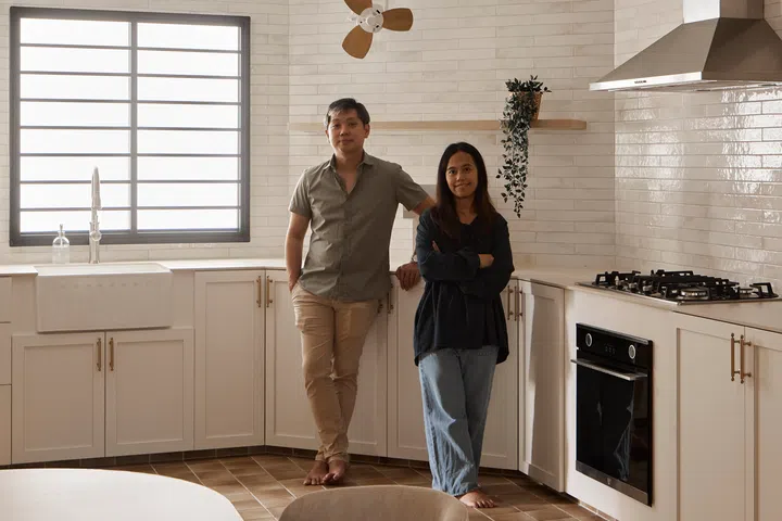 Interior designers Jeremy (left) with project manager Syahidah, whose collaborative approach helped bring the couple’s vision of a warm, family-friendly home to life.