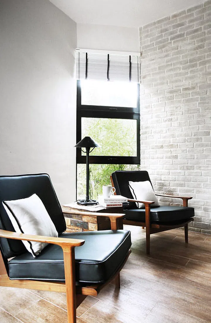 Rather than paint over a real brick or faux brick treatment, homeowner Adele picked an off-white faux brick for a more authentic look.