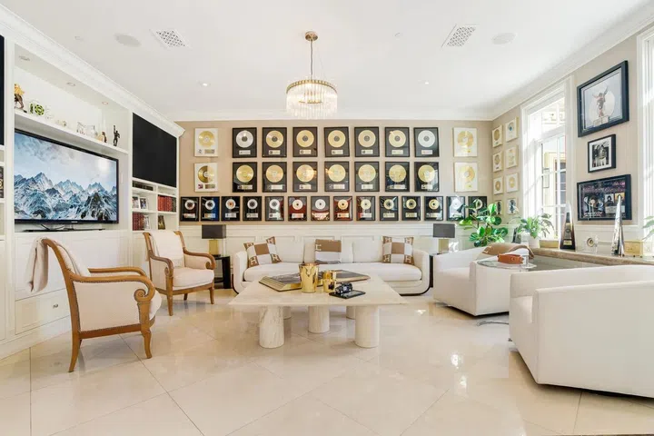 Marble accents and designer light fixtures enhance the home.