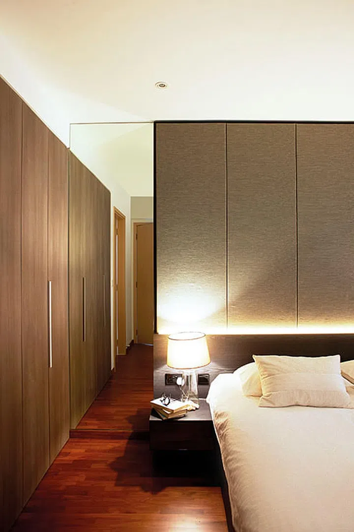 A sponge headboard cladded with fabrics from Bode, along with glass-finish bedside drawers, were designed to add a sense of luxury to the master bedroom.