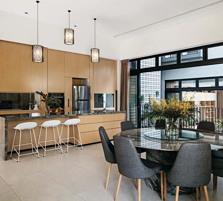 The home has interesting tiered levels and the dining room and kitchens are located on
a higher level, along with the car porch.