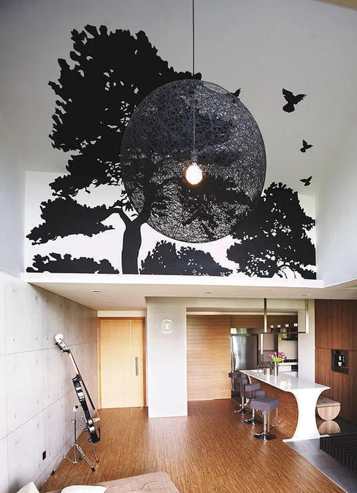 Minimalist loft-style interior design for a couple and their 2 children’s penthouse apartment in Yio Chu Kang.