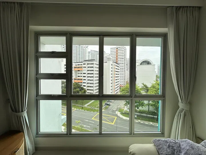 Curtains add a secondary layer of control—softening glare and improving privacy, while window configurations like top panels still allow for ventilation when needed.