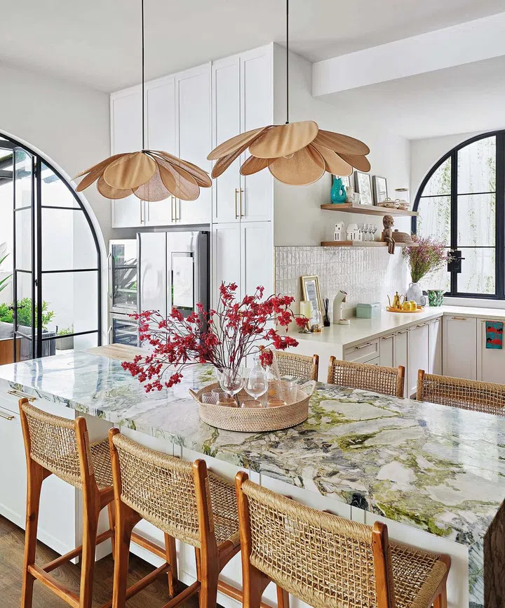 A pair of Petal lamps from Maison Flaneur is the perfect embellishment to the dry kitchen.