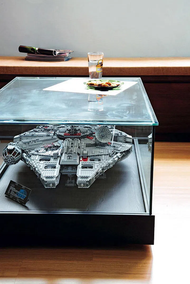 Turn your favourite item into the centre piece of your living room by containing it within your coffee table! Interior design by Celsius Ink