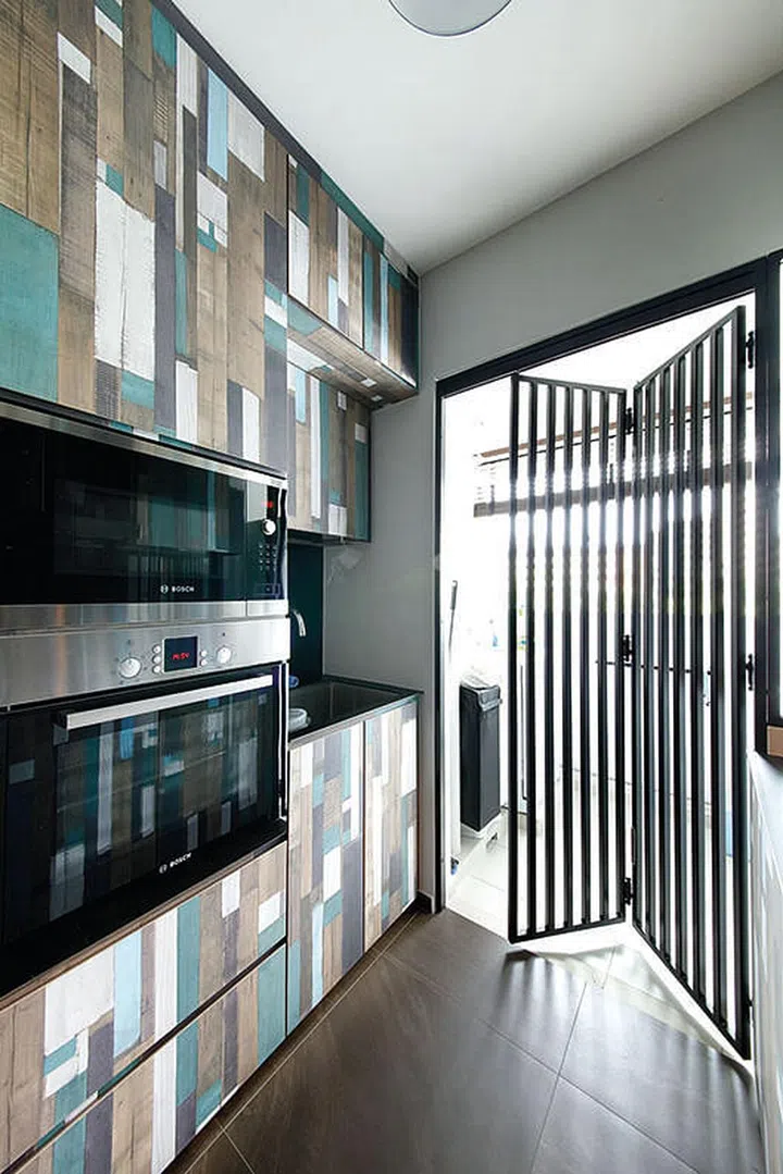 Kitchen cabinets sport patchwork-style laminates.