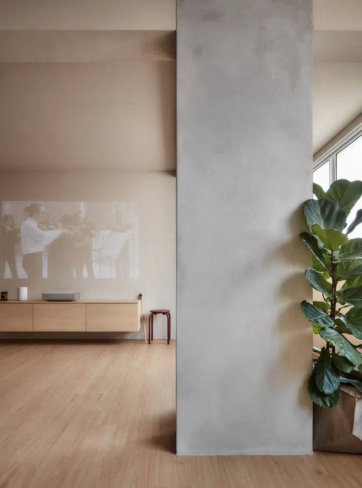 A floating television console also doubles up as a shoe cabinet as it is right beside the main entrance.