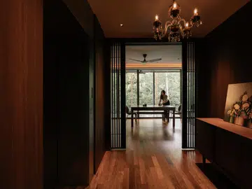 The homeowners of this six-bedroom apartment envisioned a mid-century modern treehouse, a home that felt intuitively grounded in nature yet quietly refined.