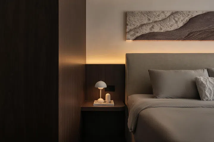 Side table lamp in the master bedroom in a 5-room HDB BTO at Tampines Street 96 (1,216 sq ft), designed by Inizio Atelier.