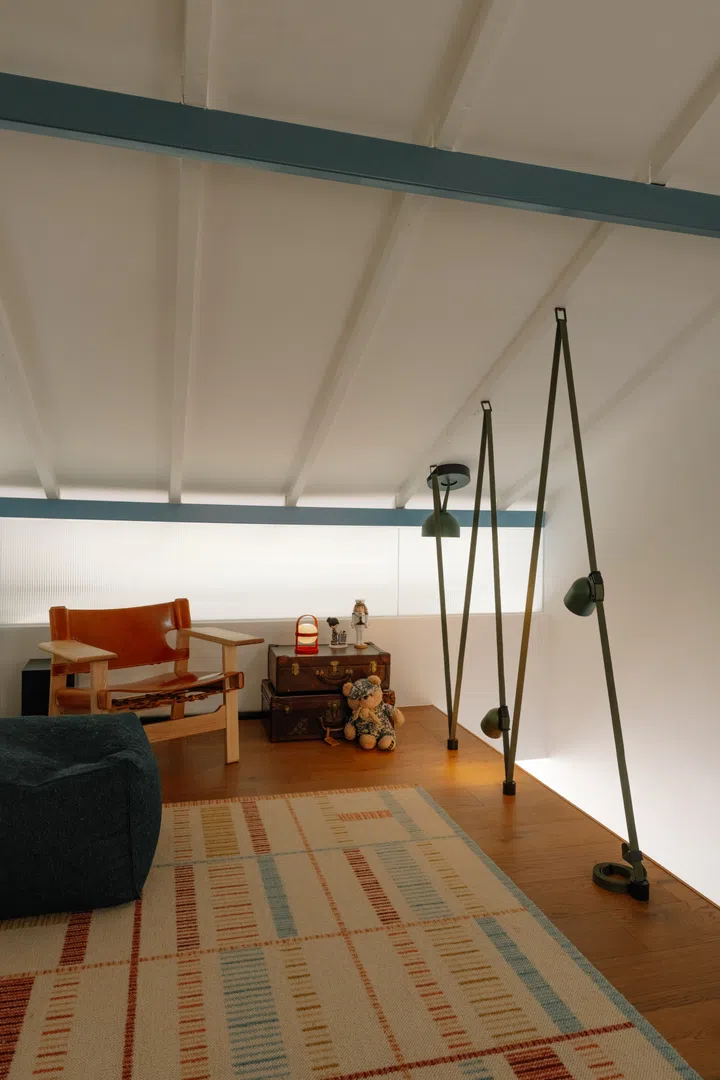 Rather than creating another enclosed room, the loft was designed as a flexible retreat for reading and relaxing.