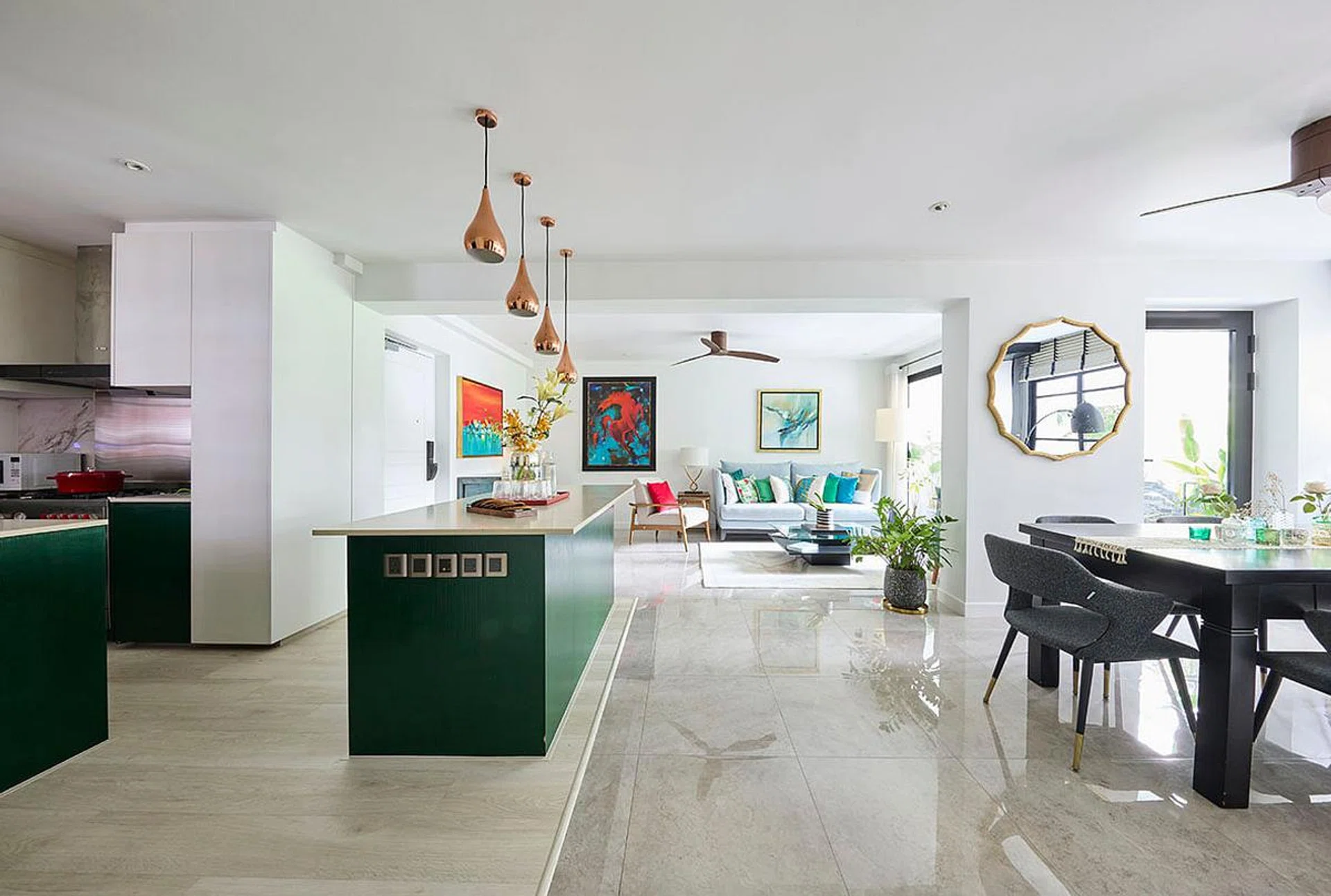 Homeowner Gayatri had bought over the unit from its previous owners, opting to retain and design around most of its existing features, such as the two kitchen islands, tiles, the sliding bar in the dining room.