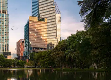 Sunset facade of the Andaz One Bangkok hotel.