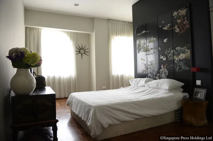 The rosewood panels in the master bedroom of Ms Goh Ling Ling's apartment in Toh Tuck Road. They were bought by Ms Goh’s mother years ago and had travelled with Ms Goh to London when she studied there in the 1990s. Ms Goh owns artisanal bag designer label Ling Wu.