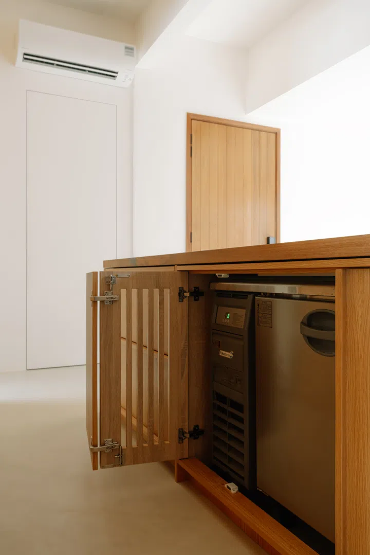 The island also conceals a commercial under-counter chiller for beers and spirits.