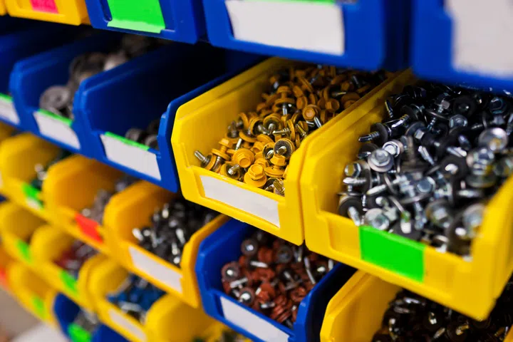 Sorted bolts in boxes in the store.