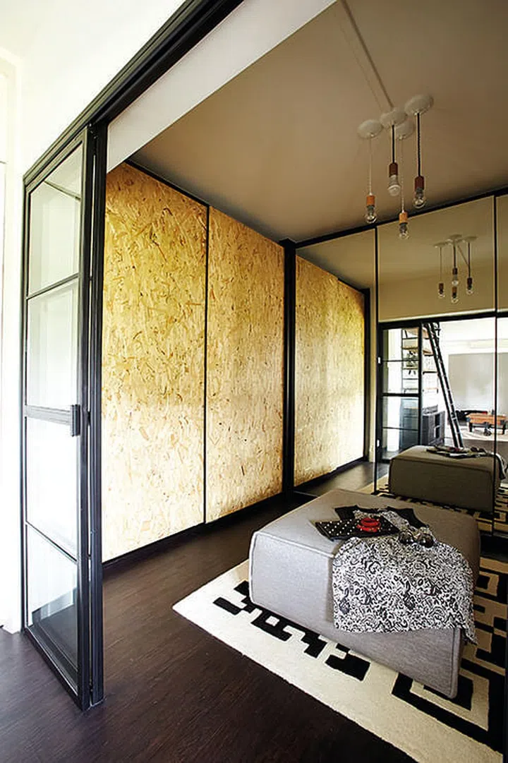 A full-length mirror placed at the end of a room gives the illusion of a longer, larger space.