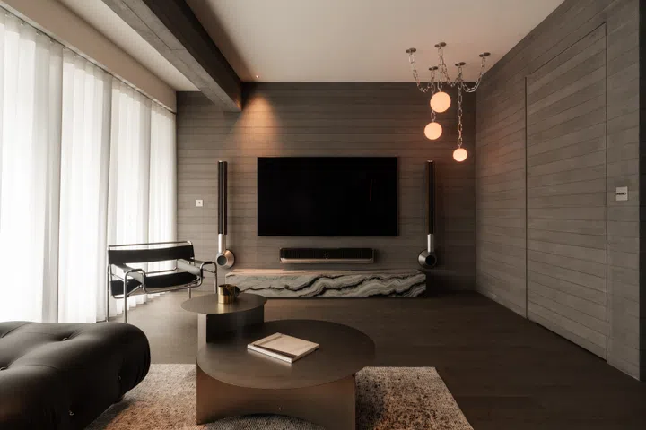 Buster + Punch Boba Chain pendant lamp hangs in the living room.