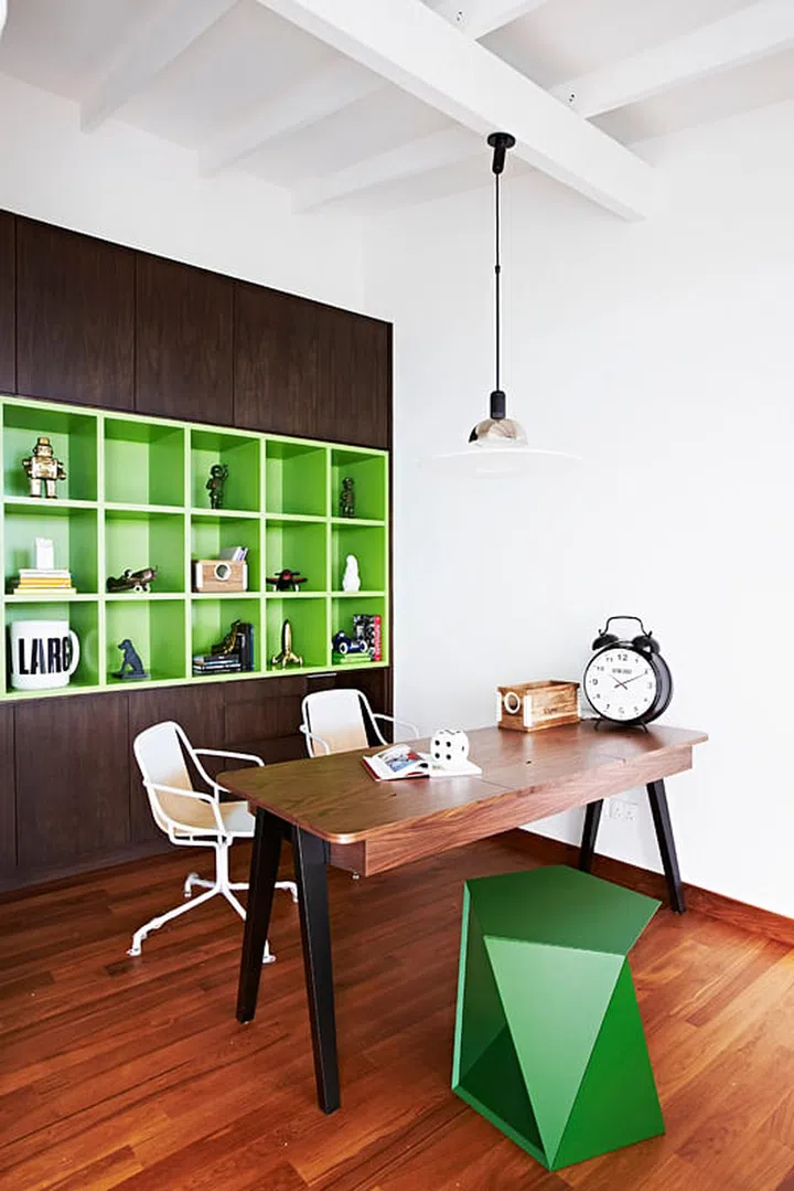 Green shelves spruce up the home office. (Reno: $300K)