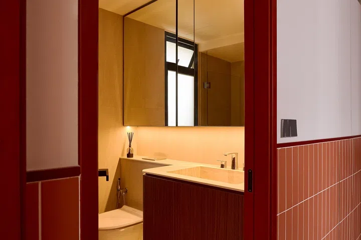 Like the rest of the home’s permanent finishes, the bathroom relies on warm timber, neutral tones and quality fittings.