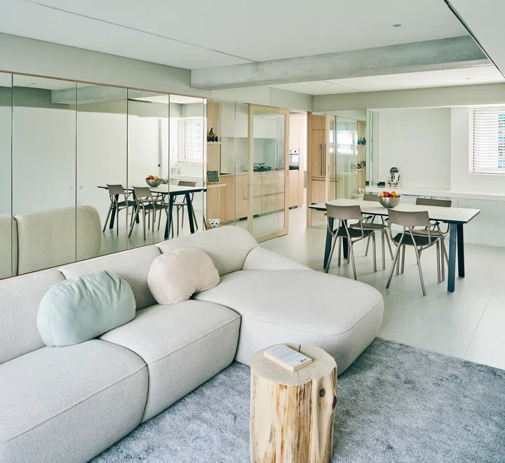 The living room ceiling was redone so that the AC system is tucked away from plan sight. 