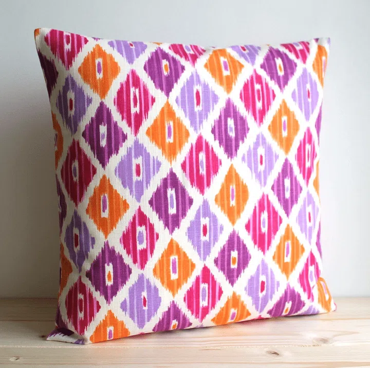 Ikat Cushion in orange and pink linen from Etsy ($16 - $20)