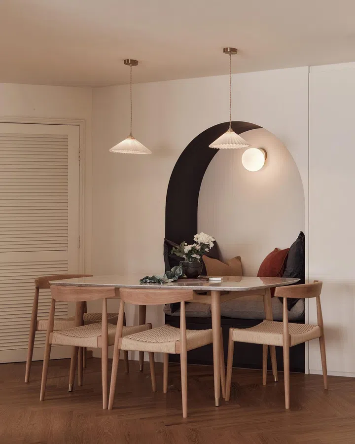Dining room in a 30s doctor couple's Parisian-style interior design Clydeswood condominium in Potong Pasir.